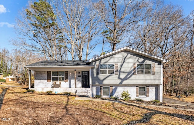 tri-level home featuring a porch