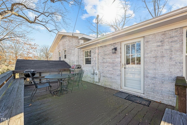 wooden terrace with grilling area