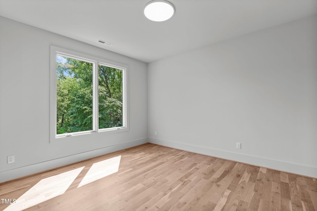 324 Waldo St, Cary, NC 27511 - empty room with light wood finished floors and baseboards
