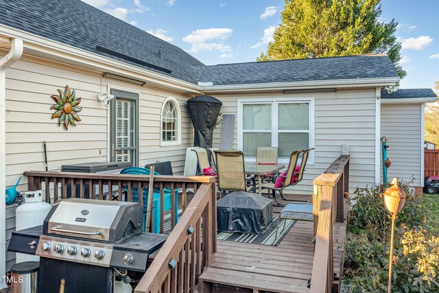 wooden terrace with grilling area