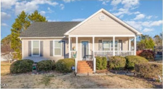 bungalow-style home featuring a porch