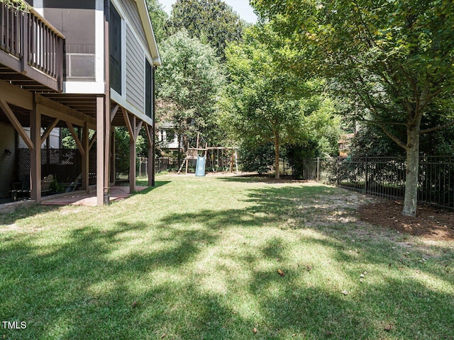 view of yard with a playground