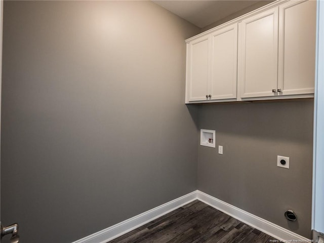 laundry room with dark hardwood / wood-style flooring, hookup for a washing machine, cabinets, and hookup for an electric dryer