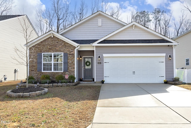 craftsman house featuring a garage