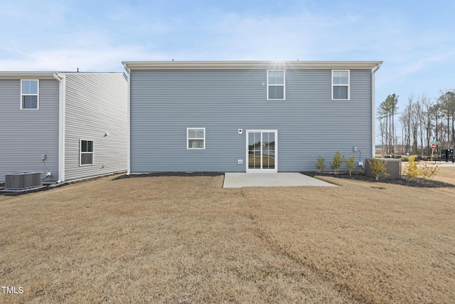 back of house with a patio, a lawn, and central air condition unit