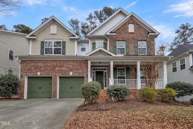 view of front facade featuring a garage and covered porch