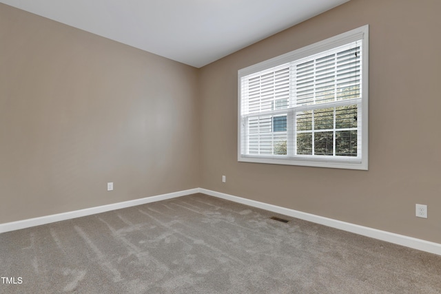 view of carpeted spare room