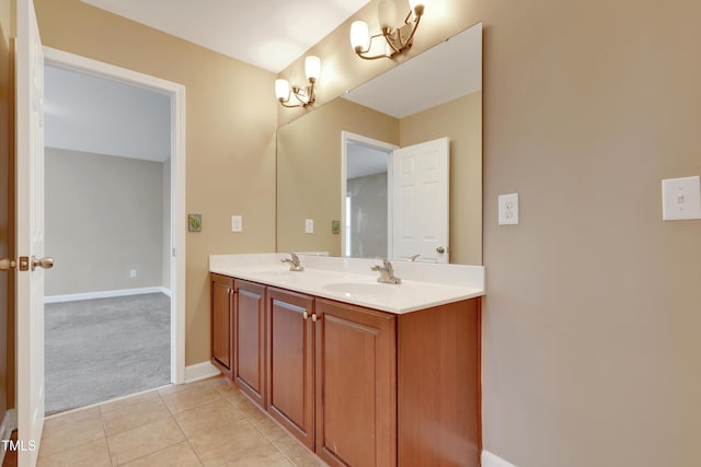 bathroom featuring tile patterned flooring and vanity