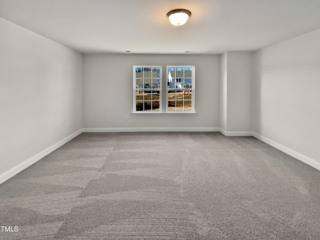 empty room featuring carpet flooring