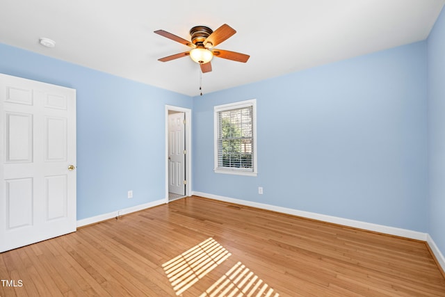 unfurnished bedroom featuring ceiling fan and light wood-type flooring