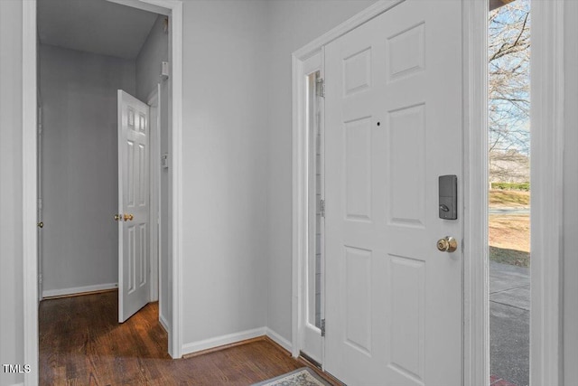 foyer with dark hardwood / wood-style flooring