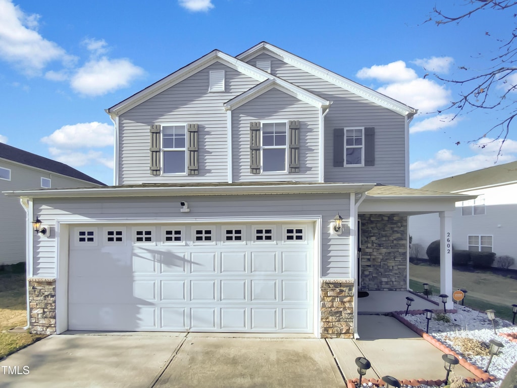 front of property featuring a garage