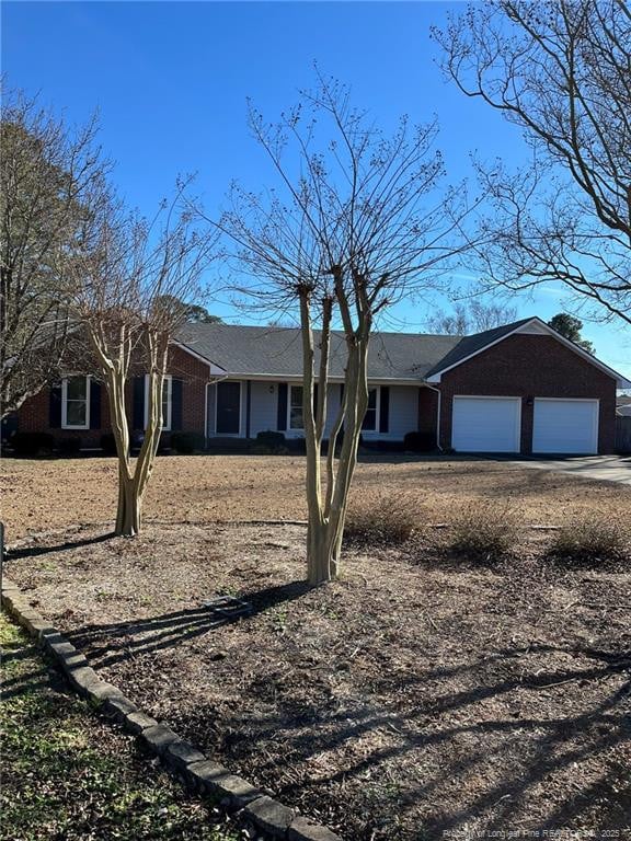 ranch-style home with a garage