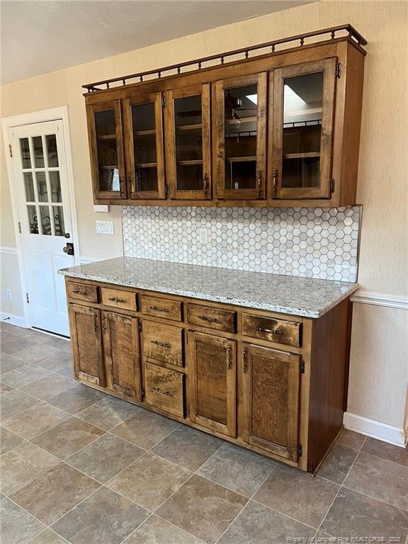 bar with light stone countertops