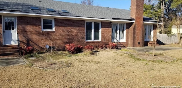 rear view of property with a patio area