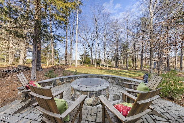 view of patio / terrace with a fire pit