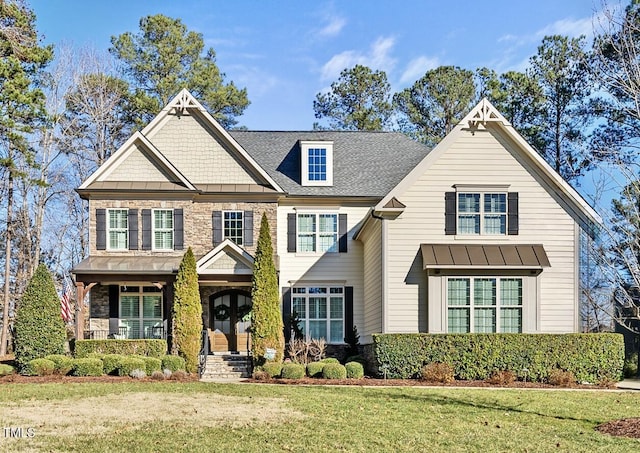 view of front of property with a front lawn