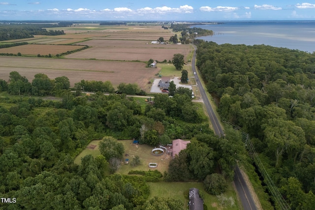 drone / aerial view featuring a water view and a rural view