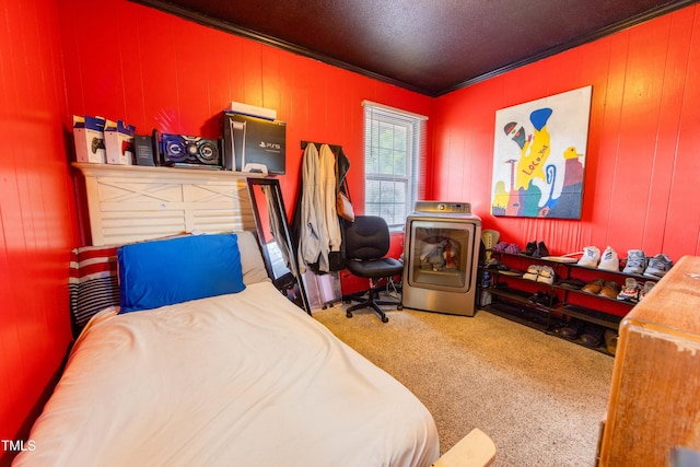 carpeted bedroom with wooden walls and ornamental molding