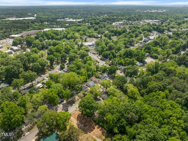 drone / aerial view of a heavily wooded area