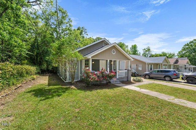 view of front facade with a porch and a front yard
