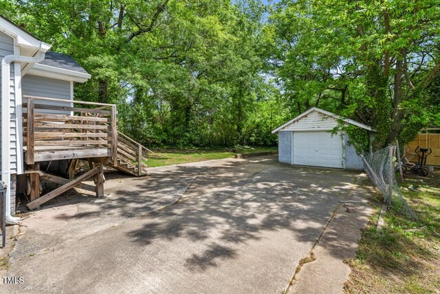 exterior space featuring stairway and view of wooded area