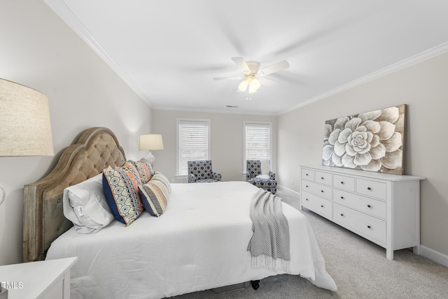 bedroom featuring light carpet, baseboards, and crown molding