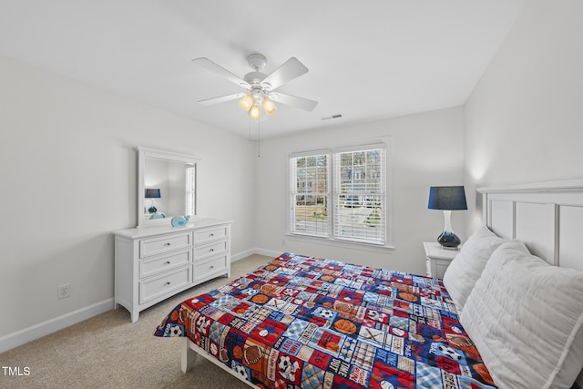 bedroom featuring light colored carpet, visible vents, ceiling fan, and baseboards