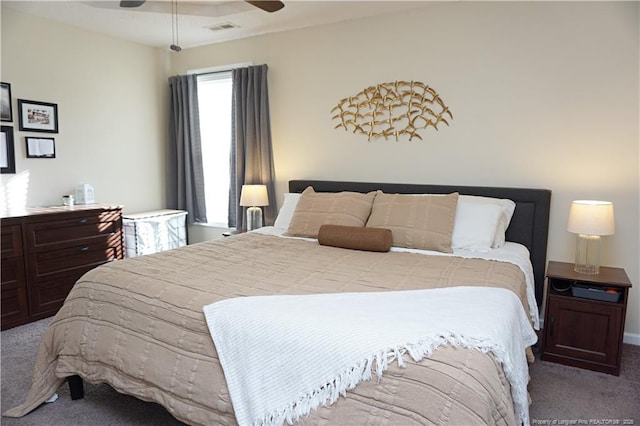 carpeted bedroom with ceiling fan