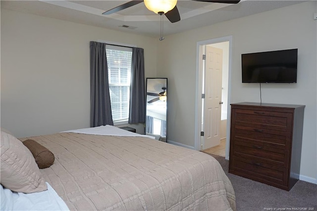 bedroom featuring ceiling fan and light colored carpet