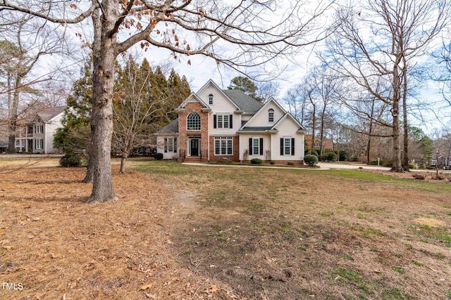 view of front facade with a front lawn