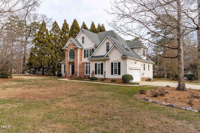 view of front facade featuring a front yard and a garage