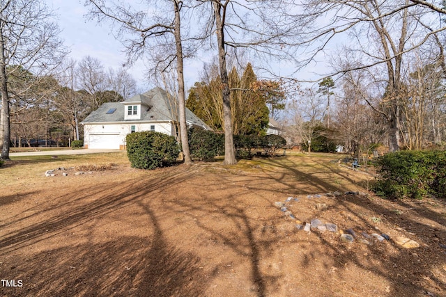 view of yard with a garage