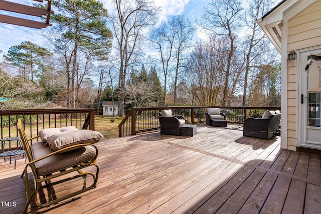 deck featuring a storage unit