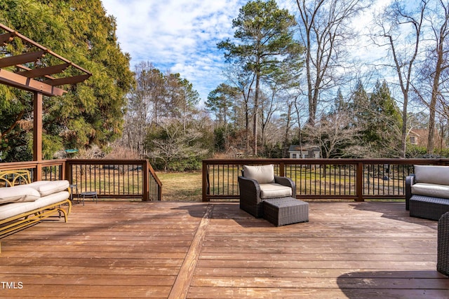 wooden deck featuring an outdoor living space