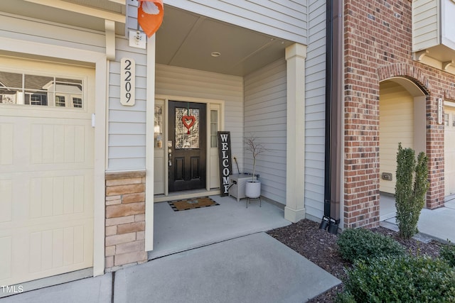 property entrance featuring a garage