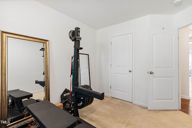 workout room with light carpet