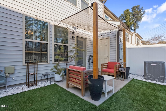 view of patio / terrace with an outdoor living space and cooling unit