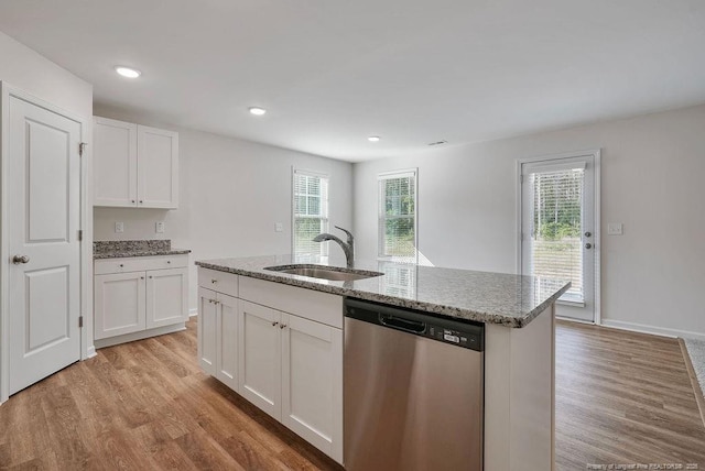 1114 Talmage Rd, Saint Pauls, NC 28384 - kitchen featuring dishwasher, a sink, light wood-style floors, light stone counters, and recessed lighting