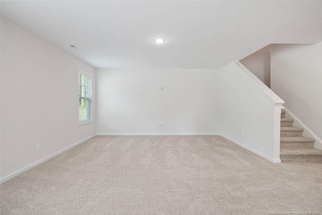 1114 Talmage Rd, Saint Pauls, NC 28384 - carpeted spare room featuring baseboards, stairway, and recessed lighting