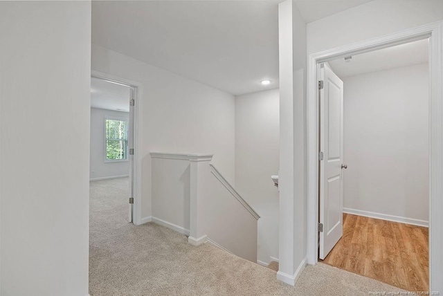 1114 Talmage Rd, Saint Pauls, NC 28384 - hallway featuring an upstairs landing, carpet flooring, baseboards, and recessed lighting