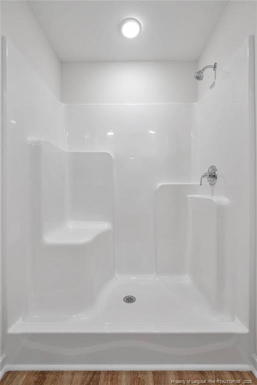 1114 Talmage Rd, Saint Pauls, NC 28384 - bathroom with a shower and wood finished floors