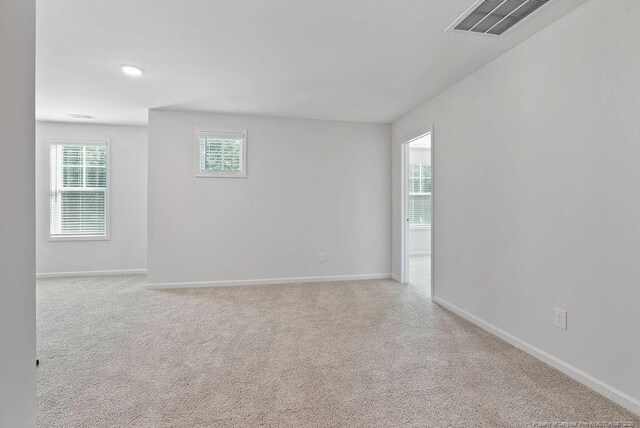 1114 Talmage Rd, Saint Pauls, NC 28384 - carpeted empty room with baseboards