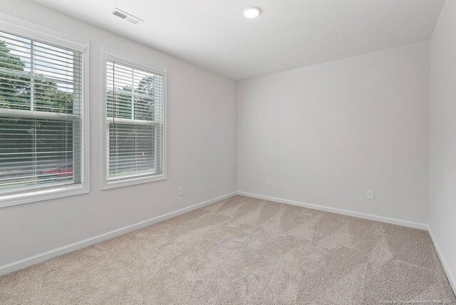 1114 Talmage Rd, Saint Pauls, NC 28384 - empty room with carpet floors and baseboards