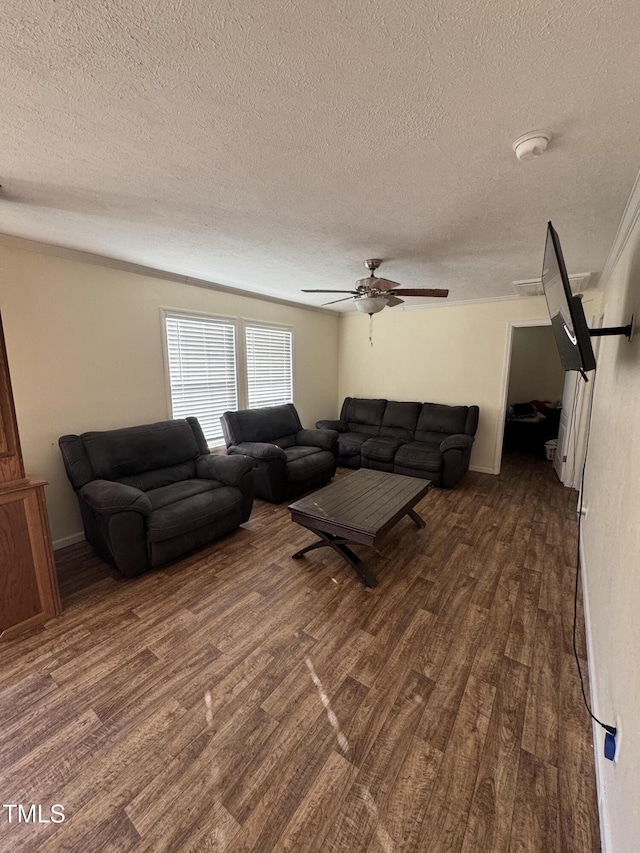 living room featuring a textured ceiling, ceiling fan, and dark hardwood / wood-style floors