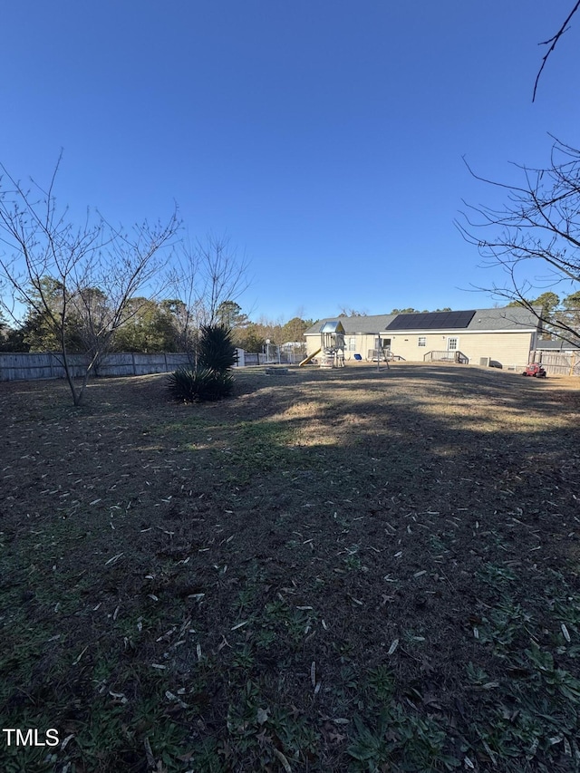 view of yard featuring a playground