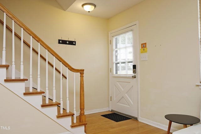 entrance foyer with light wood-type flooring