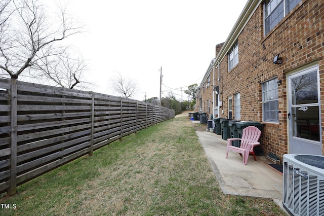 view of yard with a patio and cooling unit