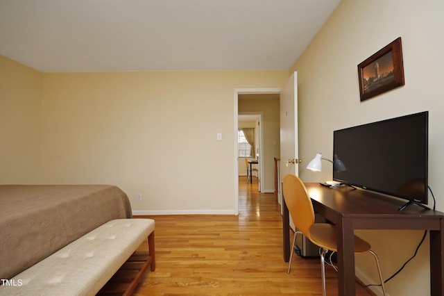 bedroom with light hardwood / wood-style floors