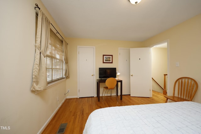 bedroom with light hardwood / wood-style flooring